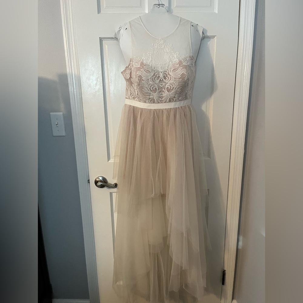Champagne and white dress perfect for bridal events.